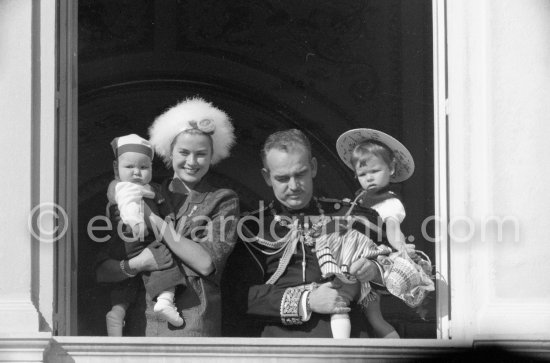 Prince Albert, Princess Caroline, Princess Grace, Prince Rainier. Fête nationale Monégasque at palace window. Monaco-Ville 1958. - Photo by Edward Quinn