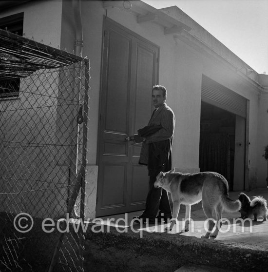 Prince Rainier with his dog Bella at at his villa Iberia. Saint-Jean-Cap Ferrat 1954 - Photo by Edward Quinn