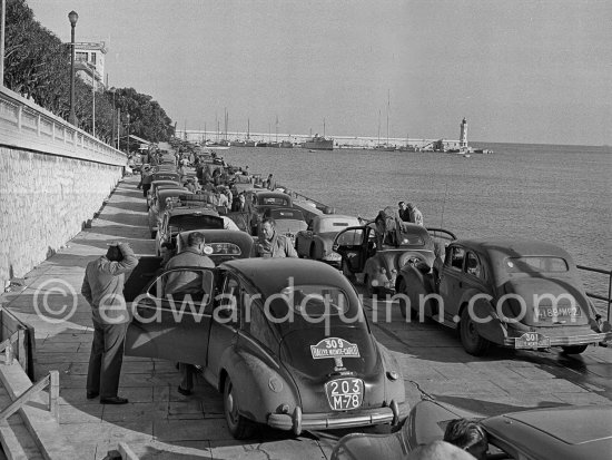 Arrival of participants, entrance to the parc fermée. N° 309 Dubois /  Correia Lobo on Peugeot 203;  N°301 Duvacher / Guerin on Hotchkiss. Rallye Monte Carlo 1951. - Photo by Edward Quinn