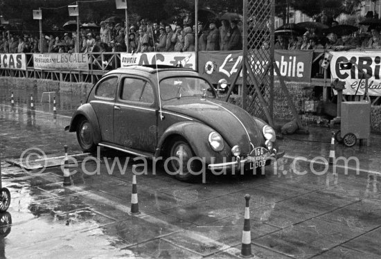 N° 166 J. de Beaufort / C. Louw on Volkswagen, undergoing the breaking and starting test. Cars will have to accelerate as fast as possible for 200 metres from a standing start, and then pull up in the shortest possible distance, for the cars have to keep a line between the axles. Rallye Monte Carlo 1951. - Photo by Edward Quinn
