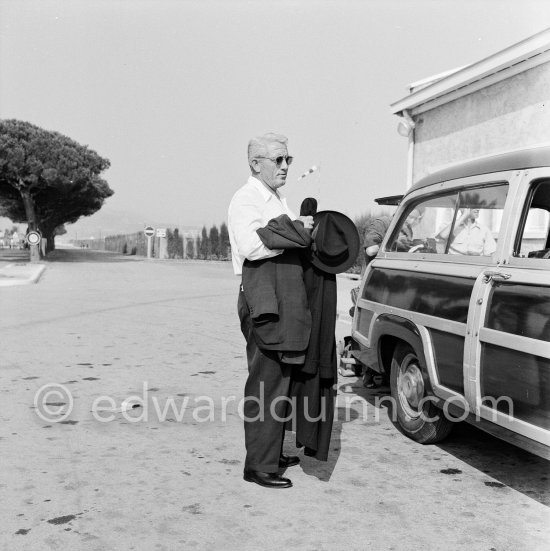 Spencer Tracy was considered an actors\' actor by his admiring colleagues. He came to Nice to sign for a film. Nice 1953. Cars: 1951 Ford Country Squire Woodie Wagon - Photo by Edward Quinn