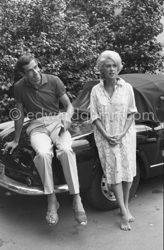 Roger Vadim and Martine Carol during shooting of "Un soir sur la plage". Nice 1961. Car: Lancia Aurelia B24 Convertibile 1956 or 57 - Photo by Edward Quinn