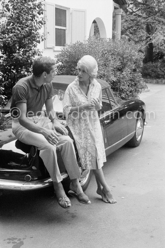 Roger Vadim and Martine Carol during shooting of "Un soir sur la plage". Nice 1961. Car: Lancia Aurelia B24 Convertibile 1956 or 57 - Photo by Edward Quinn