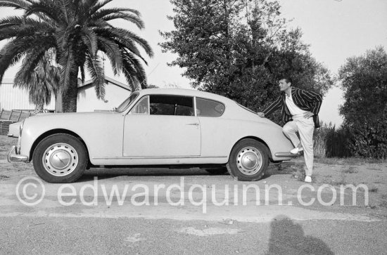 Henri Vidal. Studios de la Victorine, during filming of "Voulez-vous danser avec moi?". Nice 1959. Car: 1958 Lancia Aurelia B20 Gran Turismo 2500 - Photo by Edward Quinn