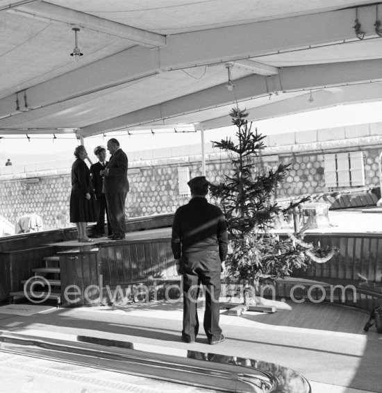 Christmas tree on Onassis\' yacht Christina. Monaco harbor 1957. - Photo by Edward Quinn