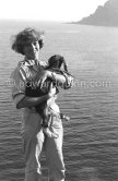 English actress Dawn Addams with a little goat during filming of "L’Île du bout du monde". She continued her career despite her marriage in 1954 to Italian nobleman Don Vittorio Emanuele Massimo, Prince of Roccasecca. Saint-Jean-Cap-Ferrat 1958. - Photo by Edward Quinn