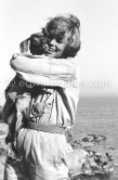 English actress Dawn Addams with a little goat during filming of "L’Île du bout du monde". She continued her career despite her marriage in 1954 to Italian nobleman Don Vittorio Emanuele Massimo, Prince of Roccasecca. Saint-Jean-Cap-Ferrat 1958. - Photo by Edward Quinn