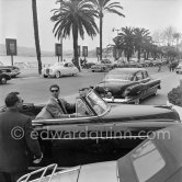 Jean-Pierre Aumont, French actor. Cannes Film Festival. On Croisette, Cannes 1954. Cars: Oldsmobile Futuramic 88 1950, 1952 Cadillac Series 62 sedan and Jaguar Mark VII - Photo by Edward Quinn