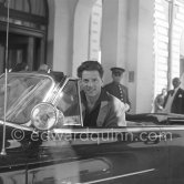 Jean-Pierre Aumont, French actor, Cannes Film Festival. Carlton Hotel, Cannes 1954. Car: 1950 Oldsmobile Futuramic 882 - Photo by Edward Quinn