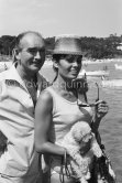 Eddy Barclay, French bandleader and owner of a record company, and Israeli actress, singer and model Daliah Lavi and her toy poodle. Saint-Tropez 1963. - Photo by Edward Quinn