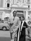 Lana Turner and Lex Barker in front of Carlton Hotel. In 1953, Lex Barker married Lana Turner. The marriage lasted four years. Cannes 1953. - Photo by Edward Quinn