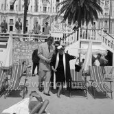Lana Turner and Lex Barker in front of Carlton Hotel. In 1953 Lex Barker married Lana Turner. The marriage lasted four years. Cannes 1953. - Photo by Edward Quinn