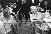 Ingrid Bergman and Ginger Rogers at a gala dinner during the Cannes Film Festival 1956. - Photo by Edward Quinn