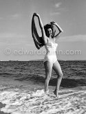 Beauty queen and model:  Myriam Bru. “Miss Cannes” and “Miss Côte d’Azur” who later married German actor Horst Buchholz and became fashion model agent. Juan-les-Pins 1951. - Photo by Edward Quinn