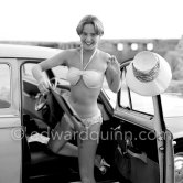 French actress Cathia Caro at the Cannes Film Festival 1958. Car: Peugot 403. - Photo by Edward Quinn