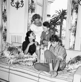 Joan Collins with her mother, brother Willie and sister Jackie, Hotel Cap d'Antibes 1957. - Photo by Edward Quinn