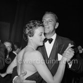 Gary Cooper with Gisèle Pascal at a gala dinner during the Cannes Film Festival 1953. - Photo by Edward Quinn