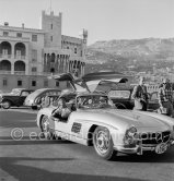 Jeanne Crain, co-star of Jane Russell in the film "Gentlemen Marry Brunettes". On the right a Monégasque policeman on duty. Monaco 1954. Car: 1954. Mercedes-Benz 300 SL Coupé - Photo by Edward Quinn