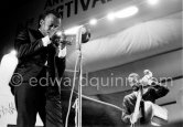 Miles Davis Quintet: Miles Davis (tpt), Ron Carter (b). Juan-Les Pins Jazz Festival, Antibes, July 28, 1963. - Photo by Edward Quinn