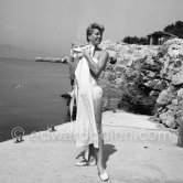 Doris Day at the fashionable beach at Eden Roc, Cap d'Antibes 1955. - Photo by Edward Quinn