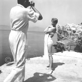 Doris Day being photographed by her husband Marty Melcher, Eden Roc, Cap d'Antibes 1955. - Photo by Edward Quinn