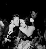 Olivia de Havilland and Kirk Douglas at a gala evening. Cannes Film Festival 1953. - Photo by Edward Quinn