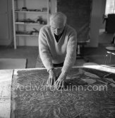 Max Ernst working on the painting "Schwalbennest". Seillans 1966. - Photo by Edward Quinn