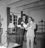 Rock Hudson at a cocktail party given by Jacques Fath (right) at his home "Moulin de Joko". Cannes 1954. - Photo by Edward Quinn