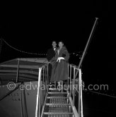 Margot Fonteyn and dancer Michael Somes, leaving Onassis' yacht Christina. Monte Carlo 1956. - Photo by Edward Quinn