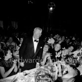 Jean Gabin at a dinner at the Cannes Film Festival in 1955. - Photo by Edward Quinn