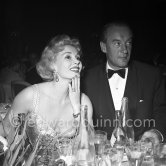Zsa Zsa Gabor and husband George Sanders. The attractive and witty film star got married several times. She loved to make headlines. In 1953 she came to the Cannes Film Festival with George Sanders. In 1955 they divorced. Cannes 1953. - Photo by Edward Quinn