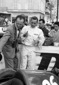 Phil Hill and and Ferrari racing manager Romolo Tavoni.. Monaco Grand Prix 1960. - Photo by Edward Quinn