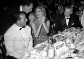 From left Giorgos Fondas, Melina Mercouri and her husband, director Jules Dassin. For "Never on Sunday". Les Ambassadeurs, Cannes 1960. - Photo by Edward Quinn