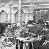 Robert Mitchum, far left Richard Todd. Cannes Film Festival 1954. - Photo by Edward Quinn