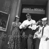 Robert Mitchum serenading his wife Dorothy Spence on a mandolin during their stay in Nice in 1954. - Photo by Edward Quinn