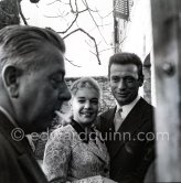 Simone Signoret, French actress, often hailed as one of France’s greatest movie stars, on her wedding in 1951 to actor and singer Yves Montand. At the same restaurant Colombe d’Or, Saint-Paul-de-Vence, where their romance began. With Jacques Prévert - Photo by Edward Quinn