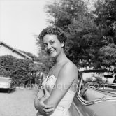 Gisèle Pascal, French actress and former girl friend of Prince Rainier. Cannes 1953. Car: Cadillac 1948 Series 62. Style 6267X Convertible Coupé - Photo by Edward Quinn