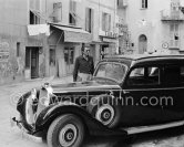 Gregory Peck in 1950 after a days work on the film "Captain Hornblower" about to leave the small French town of Villefranche. One of the earliest press photos of Edward Quinn. Car: 1933-37 Mercedes-Benz 230 Pullman Limousine - Photo by Edward Quinn