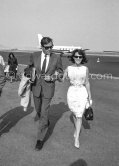 Gregory Peck and his wife Véronique arriving at Nice Airport, 1961. Peck married the French journalist Véronique Passani in 1955. They bought a house at Saint-Jean-Cap-Ferrat and spent part of each year on the Riviera. - Photo by Edward Quinn