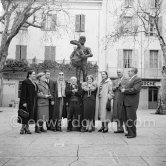 Pablo Picasso with a Sovjet Film delegation. From left Catherine Litvinenko, Hélène Parmelin, Paulo Picasso, Serge Youtkevitch (director), Ljubov Orlova (with fur collar), Klara Luchko, Akaky Khorava, Grigori Alexandrov (director) in front of Pablo Picasso sculpture "L’homme au mouton". Place Paul Isnard, Vallauris 1954. - Photo by Edward Quinn