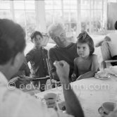 Déjeuner at restaurant Nounou. Claude Picasso, Paloma Picasso, Manuel Angeles Ortiz. Listening to Francisco Reina "El Minuni" who sings. Golfe-Juan 1954. - Photo by Edward Quinn