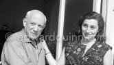 Pablo Picasso and Jacqueline. She is wearing a dress with printed motifs of a Pablo Picasso work. La Californie, Cannes 1956. - Photo by Edward Quinn