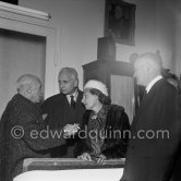 Pablo Picasso at a private viewing of his book illustrations in the Matarasso gallery in Nice. With Louis Aragon, his wife, famous lady communist Elsa Triolet and Maurice Thorez. "Pablo Picasso. Un Demi-Siècle de Livres Illustrés". Galerie H. Matarasso. 21.12.1956-31.1.1957. Nice 1956. - Photo by Edward Quinn