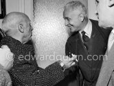 Pablo Picasso at a private viewing of his book illustrations in the Matarasso gallery in Nice. With Louis Aragon and Henri Matarasso. "Pablo Picasso. Un Demi-Siècle de Livres Illustrés". Galerie H. Matarasso. 21.12.1956-31.1.1957. Nice 1956. - Photo by Edward Quinn