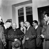 Pablo Picasso at a private viewing of his book illustrations. With Maurice Thorez, Jean Cocteau, Henri Matarasso, Georges Tabaraud, (editor of "Le Patriote", a french communist daily Newspaper). Exposition "Pablo Picasso. Un Demi-Siècle de Livres Illustrés". Galerie H. Matarasso. 21.12.1956-31.1.1957. Nice 1956. - Photo by Edward Quinn