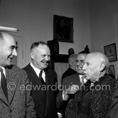 Pablo Picasso at a private viewing of his book illustrations in the Matarasso gallery in Nice. With Laurent Casanova, Maurice Thorez, Henri Matarasso. "Pablo Picasso. Un Demi-Siècle de Livres Illustrés". Galerie H. Matarasso. 21.12.1956-31.1.1957. Nice 1956. - Photo by Edward Quinn