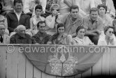 High tension moment at the bullfight. From left: Luis Miguel Dominguin, Lucia Bosè, Jacqueline, behind Dominguin (spectator because of injuries), second row Pablo Picasso’s chauffeur Jeannot, Catherine Hutin. Corrida des vendanges. Arles 1959. - Photo by Edward Quinn