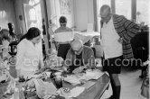 Theodor "Teto" Ahrenberg, Swedish collector, his wife Ulla and daughter Annette. Pablo Picasso signing a photo by Edward Quinn. La Californie, Cannes 25.10.1959. - Photo by Edward Quinn