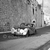 N° 173 Owens / Pitts on Healey Tickford. Rallye Monte Carlo 1953. To prevent the competitors from taking the timekeepers by surprise and passing without being spotted the organisers decided to paint the front wings of the cars white with washable paint. This enabled the officials to identify them a long way off even if their rally plates were not easily visible because of dirt or their position on the car. (Louche p. 118) - Photo by Edward Quinn