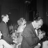 At the Cannes Film Festival in 1953, the film "Le Salaire de la Peur", directed by Georges Clouzot was shown. Present at the première were Edward G. Robinson, Ann Baxter, greeted by Orson Welles (hidden). Cannes 1953. - Photo by Edward Quinn